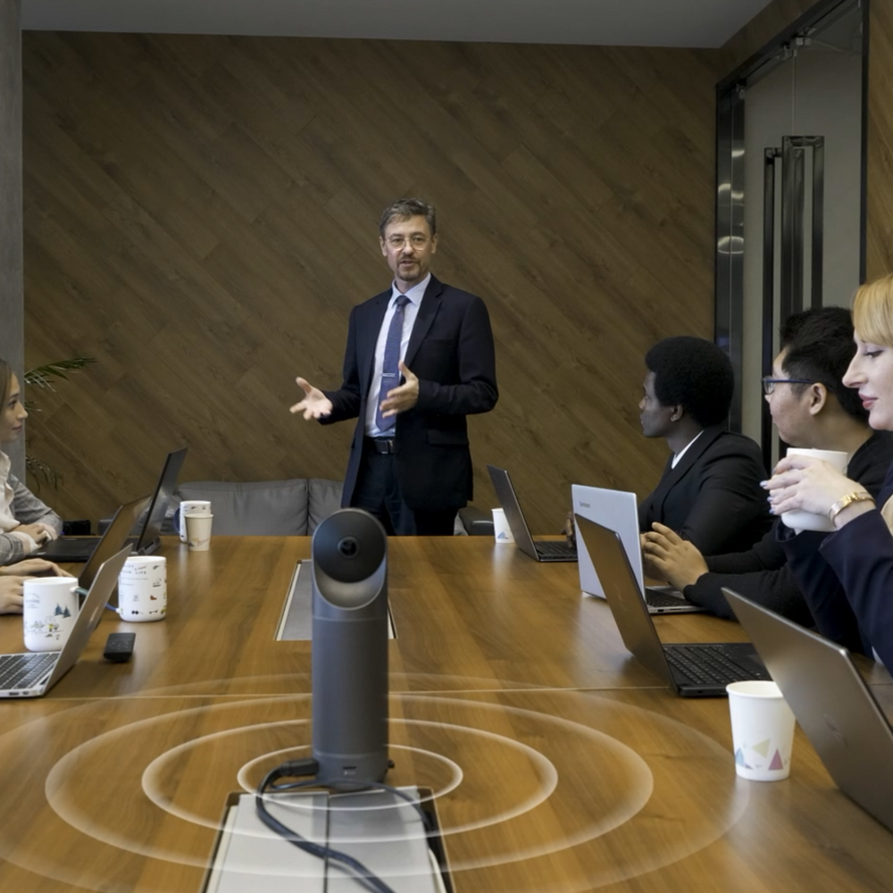 Why Smart Cameras with Speaker Tracking and Auto-Framing are Essential for Room-Based Video Conferencing?